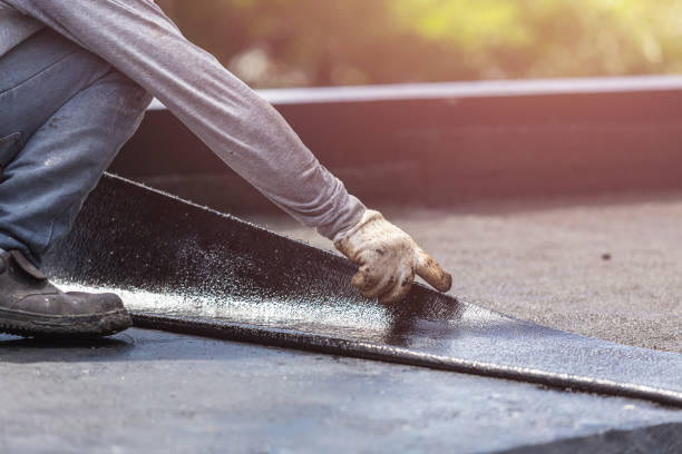 Professional Basement Waterproofing technician working in Eldorado, WI